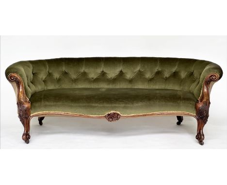 SOFA, Victorian walnut with deep button green velvet upholstery, and carved supports, 198cm W. 