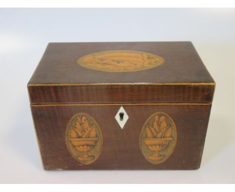 A Sheraton period mahogany and shell inlaid tea caddy  