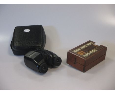 A shooting stick, stags horn handled thumb stick, a pair of Nikon opera glass, bezique marker and pack of cards  