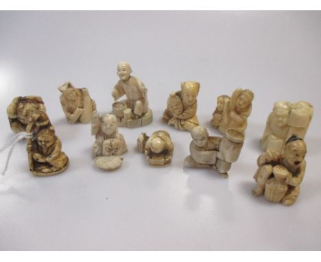 Eleven late 19th early 20th century marine ivory netsuke  