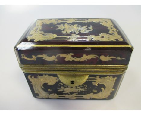 A 19th century French ruby glass and gilt mounted trinket box  