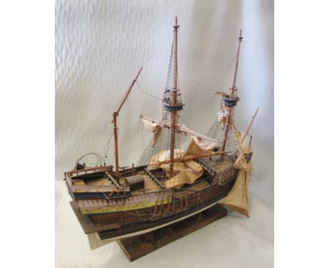 A scale wooden model of a 16th century British Galleon, 55cm (21.5in) long overall  