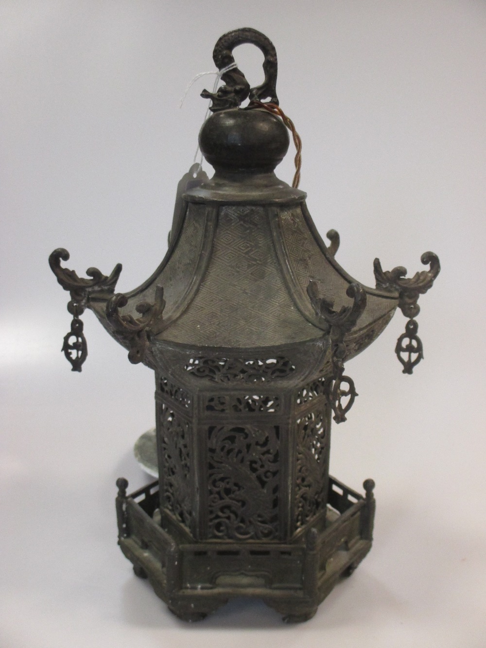 A Chinese lead lantern in - Cheffins Fine Art