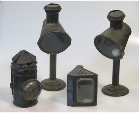 A pair of candle lamps, a hand-held miner's lamp and another, Hebbert & Co, refurbished Farwic Bulloch lamp  