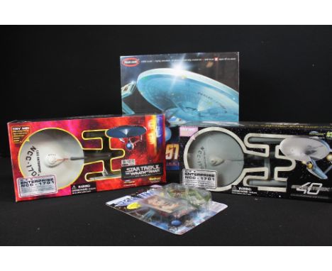 STAR TREK MODELS AND FIGURINE - a 25th Anniversary model of the U.S.S. Enterprise NCC-1701 16-inch starship from Star Trek II