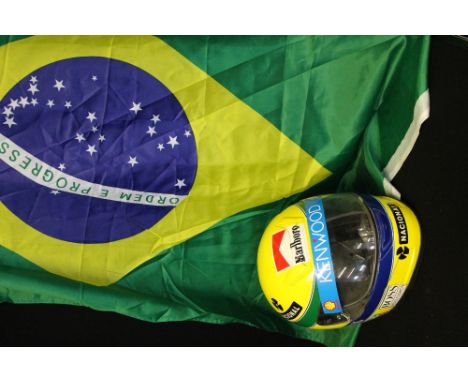 AYRTON SENNA REPLICA HELMET AND BRAZIL FLAG - a full sized Aryton Senna replica helmet and brazil flag.