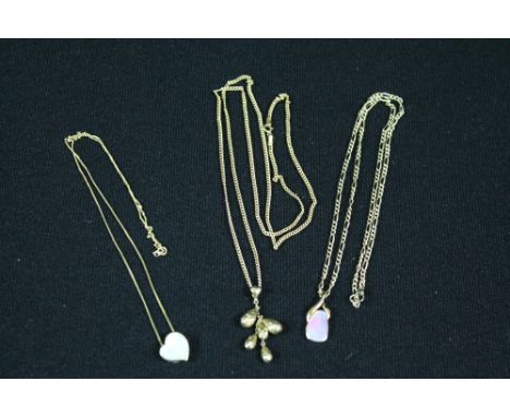 NECKLACE - a collection of three necklace and pendants. To include an opal pendant with 14k mount and 9k figaro chain, a moth