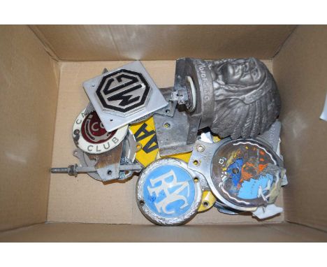 Box containing a quantity of vintage car badges, RAC, AA and metal badge featuring an Indian Headress for Guy Motors