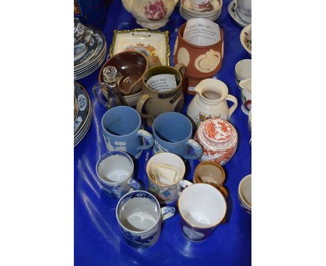A group of pottery commemorative wares and mugs including a loving cup from Pilkingtons Tiles, commissioned by Poole Pottery 