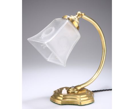 A BRASS ANGLEPOISE&nbsp;DESK LAMP, with frosted glass shade and having a quatrefoil base. 26cm highThe absence of a Condition