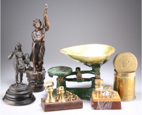 A LATE 19TH CENTURY SPELTER FIGURE OF A SILVERSMITH WITH EWER AND DRAWING,&nbsp;26cm high;&nbsp;A SPELTER FIGURE OF A MAIDEN&