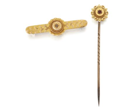 A VICTORIAN DIAMOND BROOCH, as a star-set rose-cut diamond to a bar with floral decoration, stamped '15CT', length 3.5cm; AND