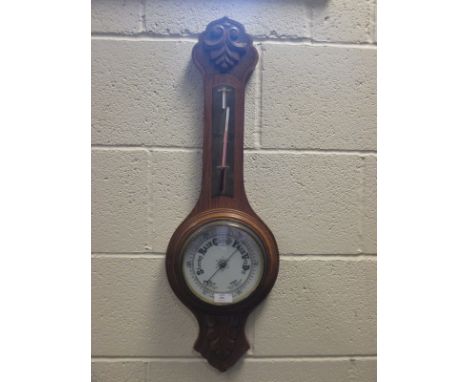 A wheel barometer  