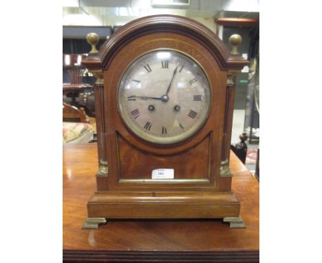 A 20th century mahogany and brass inlaid mantle clock  