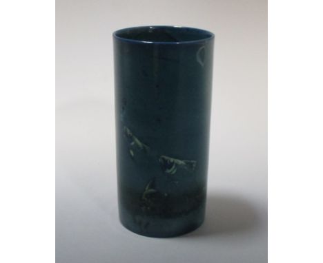 A Royal Worcester Sabrina ware cylindrical spill vase, date code for 1928, painted by W H Austin with three green fish agains