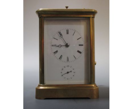 A repeating brass cased carriage clock with alarm  