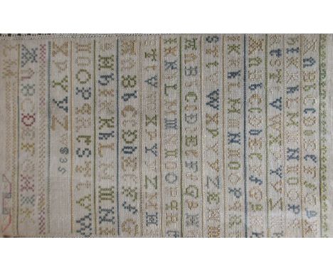 A 19th century alphabet sampler in maple frame  