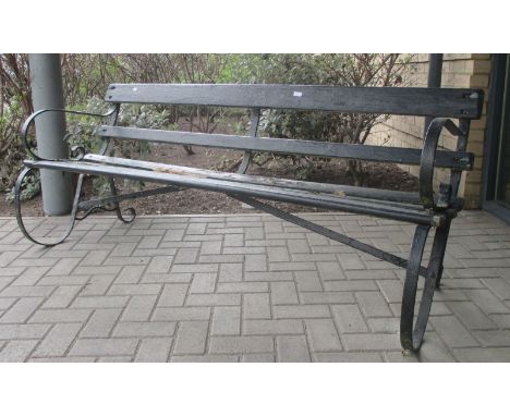 A 19th century wrought iron garden bench  