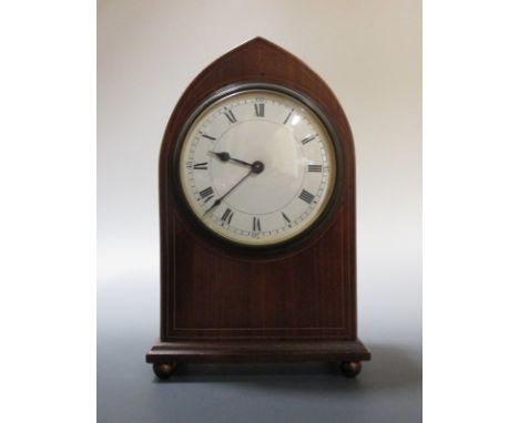 Two arched case mahogany mantel clocks and an oak mantel clock (3)  
