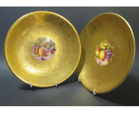 A pair Royal Worcester gilt decorated cabinet plates and painted with fruit, signed by J Reed and H Henry, 24cm  