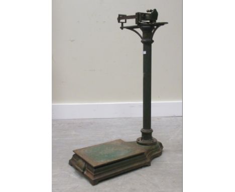 A set of green painted aviary scales together with a candlestick  