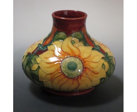 A Moorcroft Inca pattern vase, decorated with sunflowers on a rust coloured ground, c.1994, impressed marks and painted monog