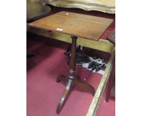 A 19th century oak tripod table  