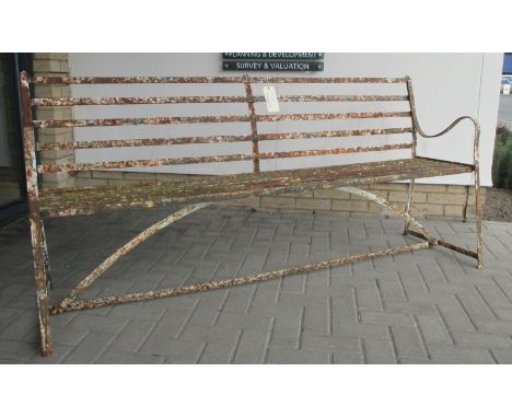 A 19th century wrought iron garden bench  
