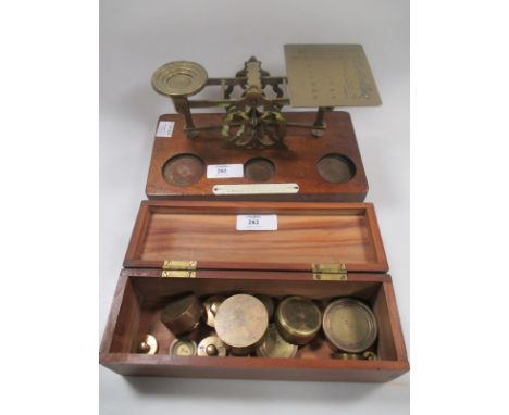 Brass postal scales by S.Mordan & Co, with various brass weights  