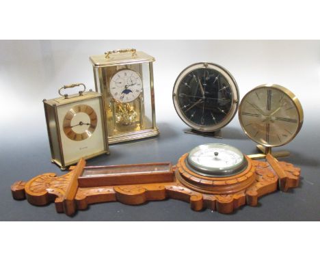 A small oak barometer by W E Pain, Cambridge together with four 20th century mantle and carriage clocks, as well as a bagatel