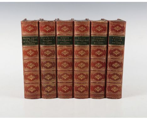 DICKENS, Charles. A Tale of Two Cities. London: Chapman and Hall, 1860. First edition in book form, early issue. 16 plates by