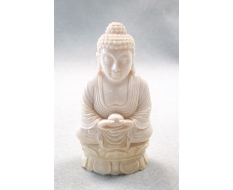 An ivory sculpture of a buddha, Republic period, Probaby Amitabha (symbolising mercy and wisdom), seated on a lotus throne, h