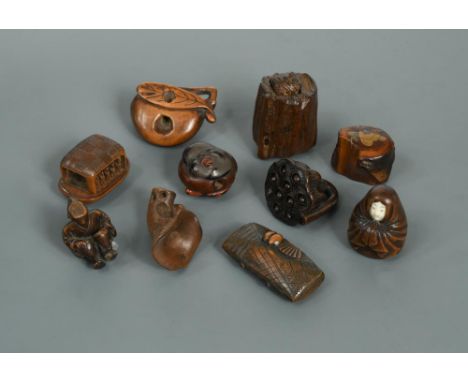 A Group of 10 wooden netsuke, mainly Meiji period, including a mushroom, a fine lacquered two sided "men-netsuke" (mask netsu