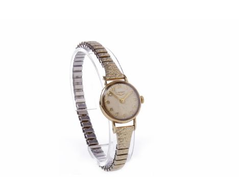 LADY'S LONGINES MANUAL WIND WRIST WATCH  the round silvered dial with applied gold Arabic numeral hour markers, outer seconds