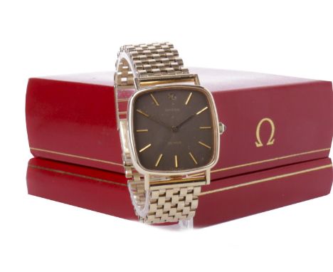GENTLEMAN'S OMEGA DE VILLE NINE CARAT GOLD MANUAL WIND WRIST WATCH originally purchased 1976 from papers, signed Omega moveme