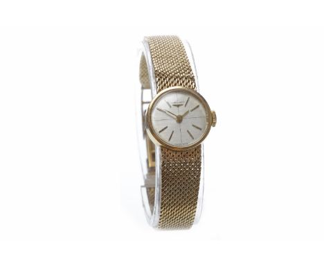 LADY'S LONGINES NINE CARAT GOLD MANUAL WIND WRIST WATCH the round silver coloured dial with applied gold baton hour markers, 