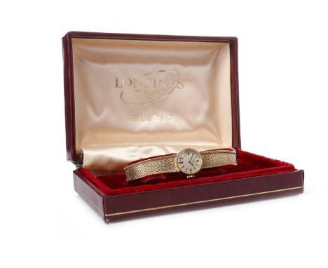 LADY'S LONGINES NINE CARAT GOLD MANUAL WIND WRIST WATCH the round dial with applied baton hour markers, pencil hands, 15mm ca