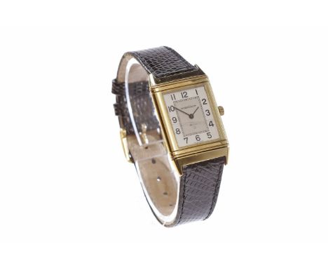 GENTLEMAN'S JAEGER LE COULTRE REVERSO EIGHTEEN CARAT GOLD MANUAL WIND WRIST WATCH the rectangular silver dial with Arabic hou