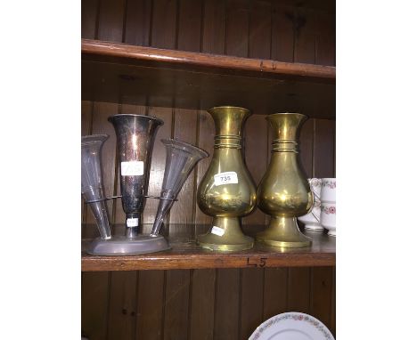 A silver plated epergne and a pair of ecclesiastical brass bases 