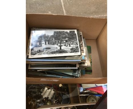 A box of vintage postcards 