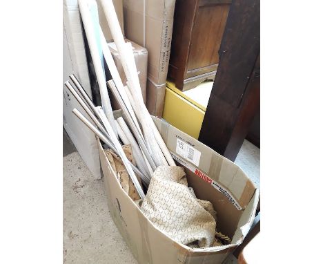 Box of curtains and poles 