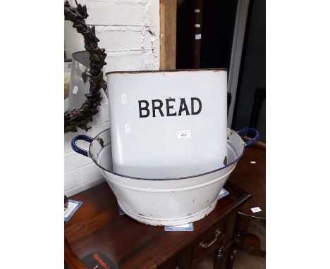 An enamel bath, bread bin and smaller metal items 