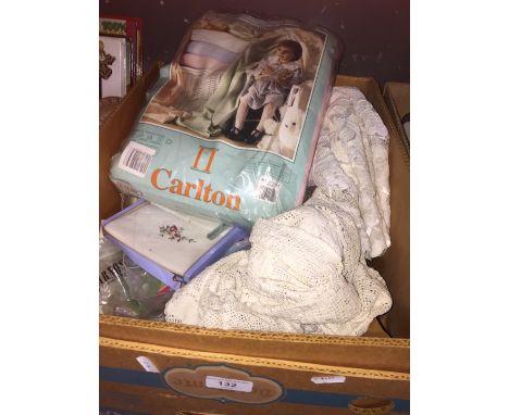 A box of linen, doilies, curtains, etc. 