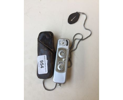 A German Minox spy cam in leather case. 