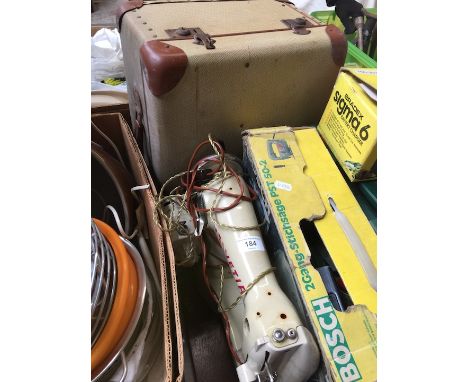 A vintage Helvetia Swiss electric machine with pedal and leads in original case. 
