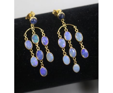 A modern pair of 14ct gold, white opal and cabochon sapphire set drop earrings, 39mm.