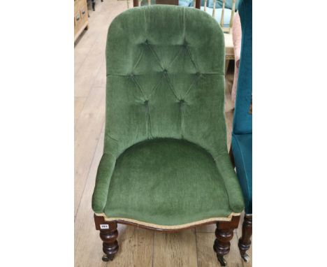 An early Victorian button back chair