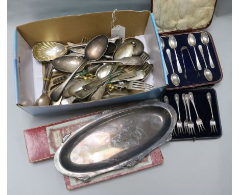 A collection of silver and plated flatware