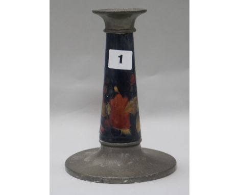 A Moorcroft pomegranate and Tudric candlestick 19.5cm.