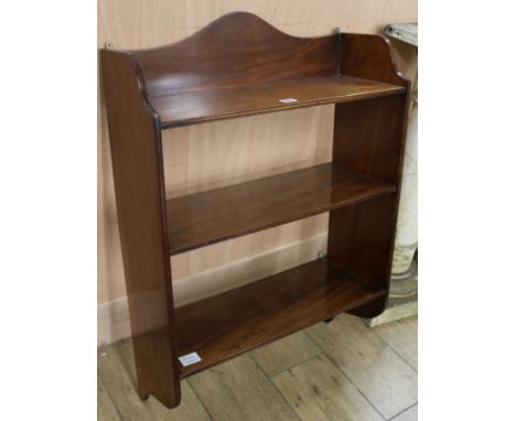 A George III style mahogany wall shelf